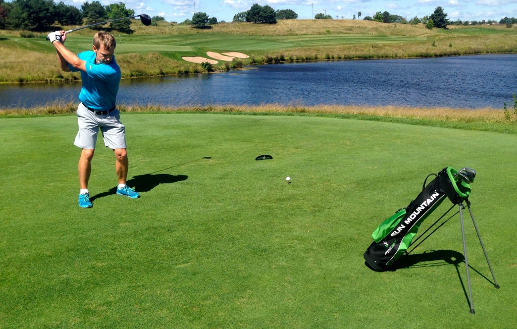 A tee shot over water was no problem for Eri Crum on the Glen Club’s 18th hole.